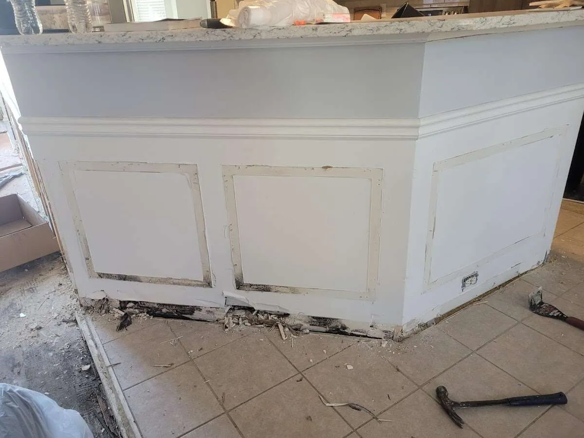 Water damage and mold on kitchen during Storm Damage Restoration in Sulphur